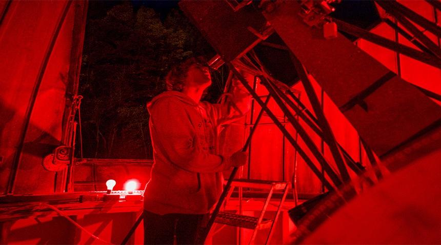 campers looking through our high powered telescope in our observatory